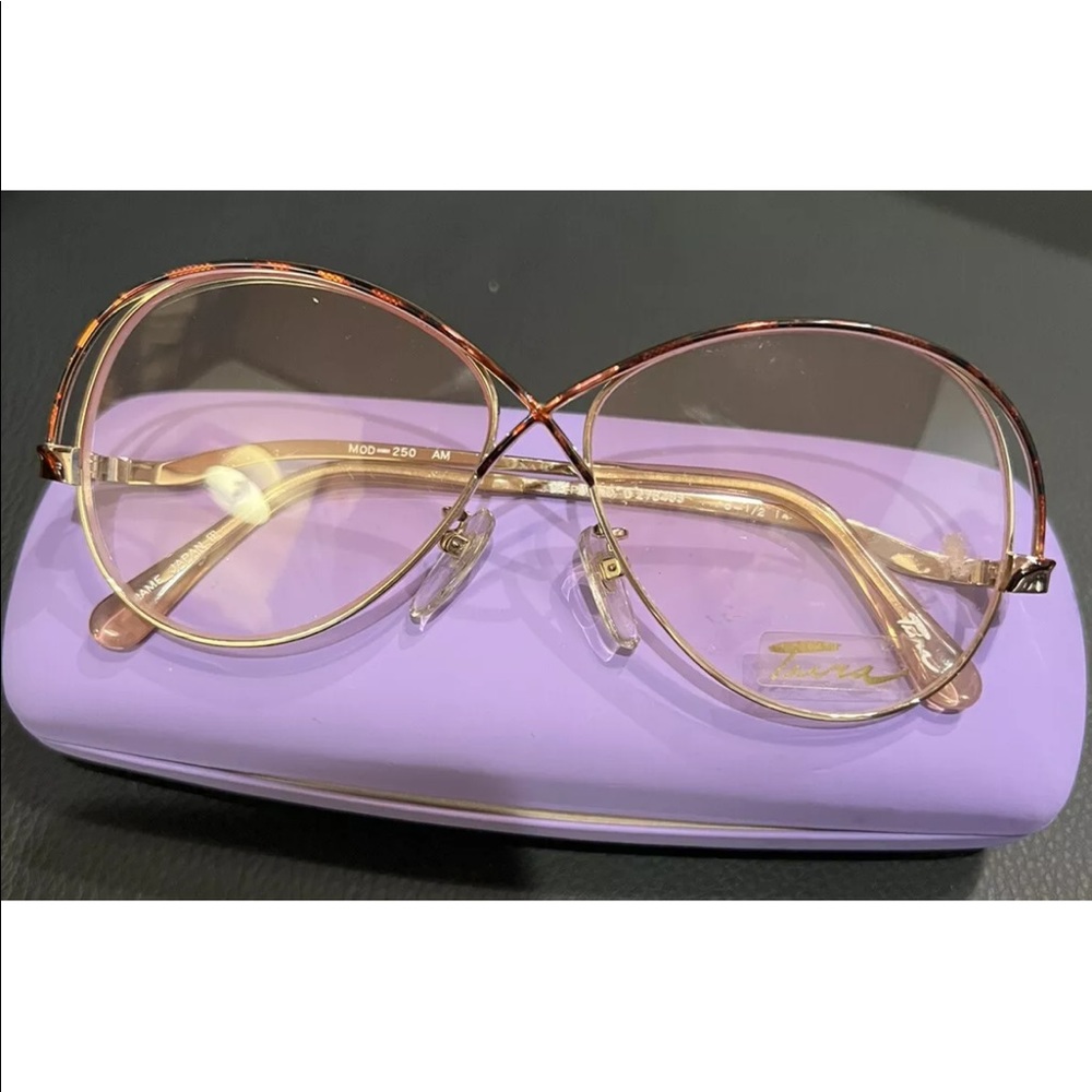 DESIGNER EYEWEAR by TURA. GOLD AVIATOR SHAPE